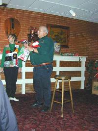 Rodney Duerksen opens his present with a certain amount of suspicion